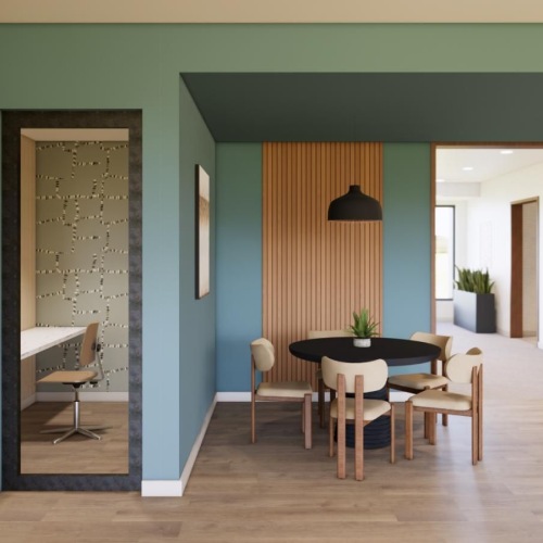 a room with a table and chairs