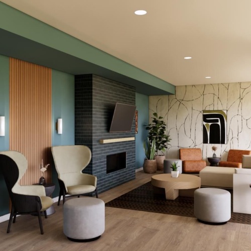 a clubroom with a tv, tables and chairs