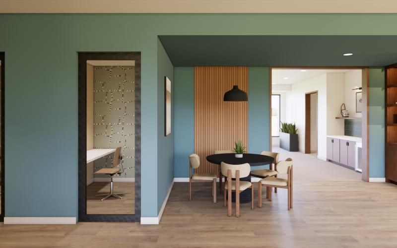 a room with a table and chairs
